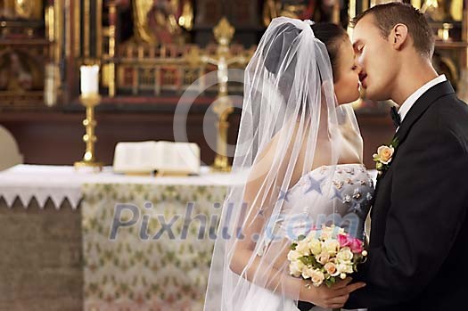 First kiss in front of the altar First kiss in front of the altar