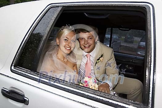 Happy couple in the car