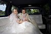 Bride and groom in the limousine