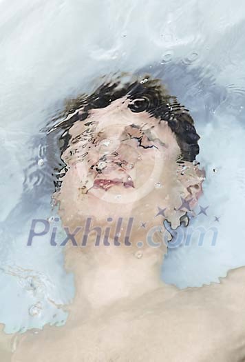 Man under water in the bath Man under water in the bath