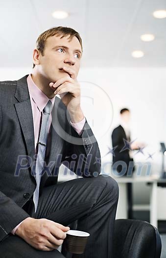 Businessman having a coffee