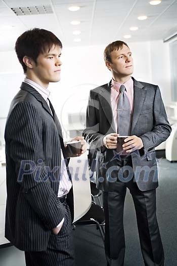 Two businessmen having a coffee Two businessmen having a coffee