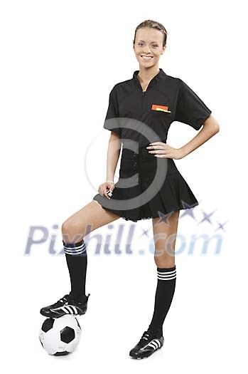 Woman referee standing foot on the ball Woman referee standing foot on the ball