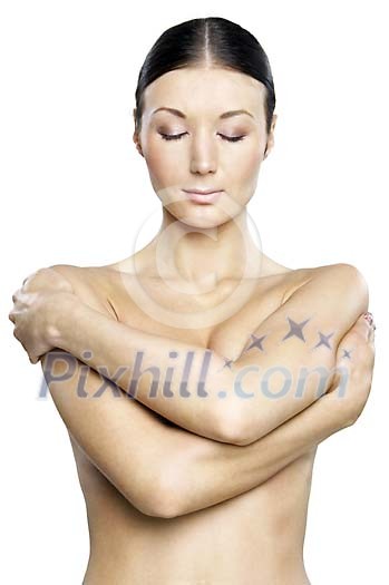 Topless woman covering her breast with hands