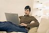 Man with laptop on the couch
