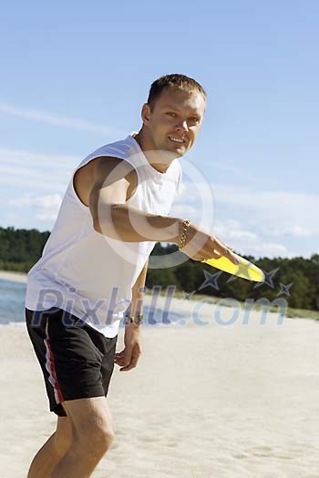 Man getting ready to throw the frisbee