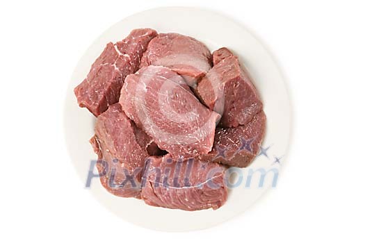 Raw red meat on the plate Raw red meat on the plate