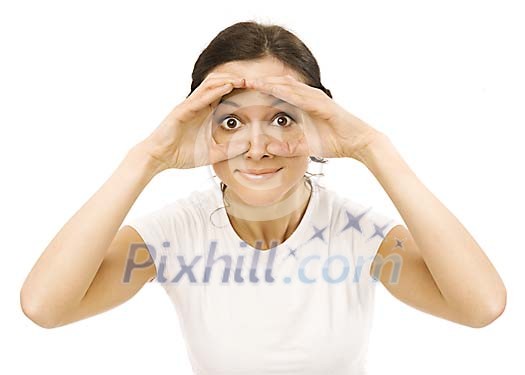 Woman looking, hands placed like holding binoculars