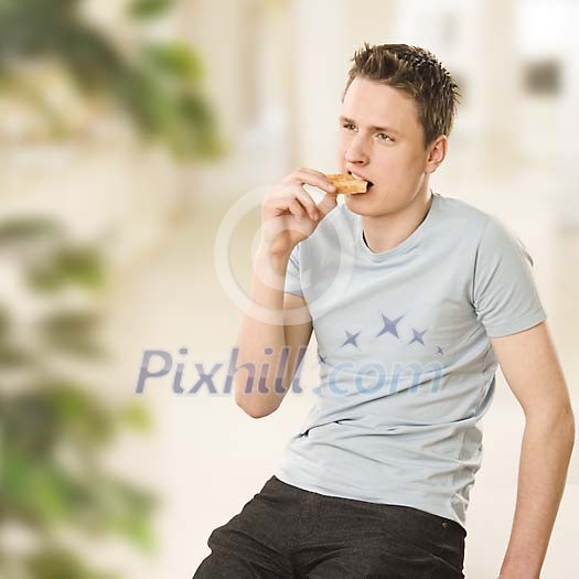 Man eating toasted bread Man eating toasted bread