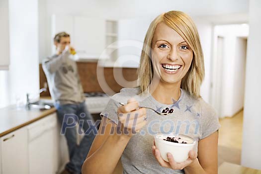 Woman having a bowl of dessert