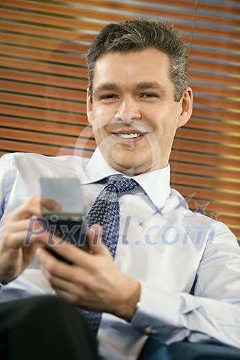 Portrait of a businessman with planner