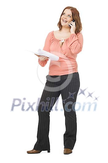 Woman standing and talking to a phone