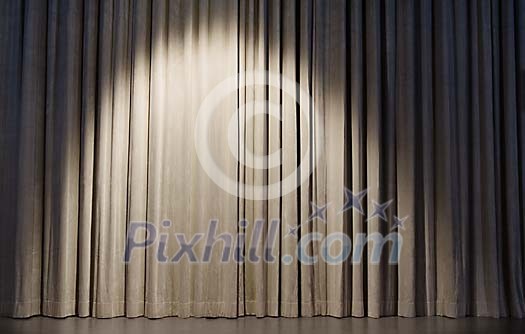 Empty stage with curtains closed