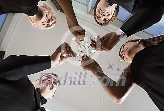 Men and women toasting Men and women toasting