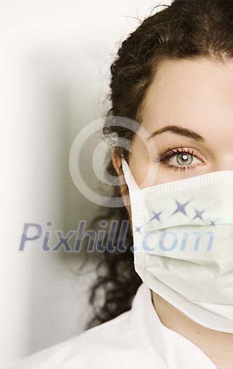 Closeup of a female doctor with mask