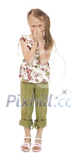 Young girl giggleing on a white background