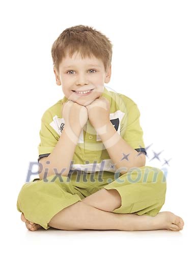 Boy sitting and smiling