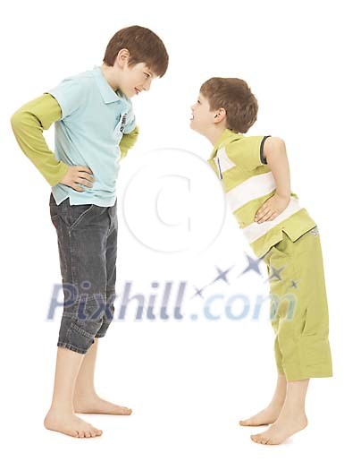 Two boys standing face to face