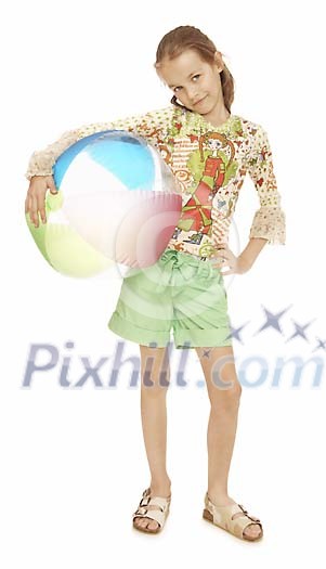 Girl posing with beach ball