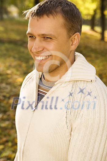 Man smiling in the forest