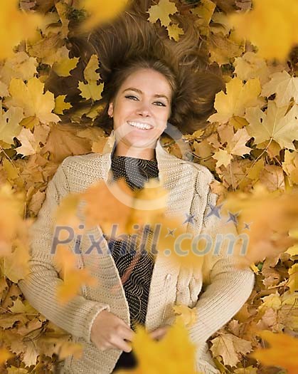 Woman lying on the leaves Woman lying on the leaves