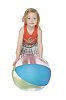 Girl standing behind the beachball