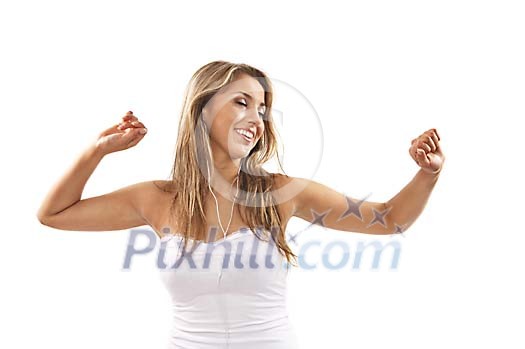 Woman dancing while listening to music