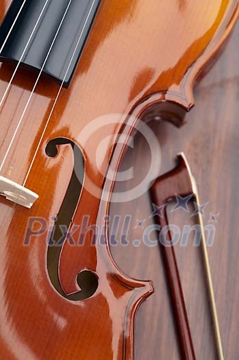 Closeup of a violin side and a spring