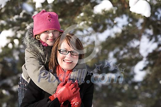 Mother and child outside on winter