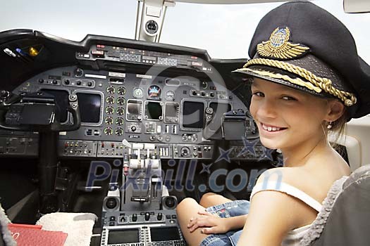 Girl sitting in the pilot seat