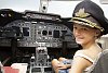 Girl sitting in the pilot seat