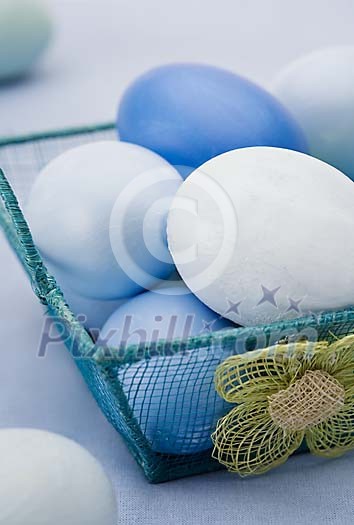 Blue eggs in the basket