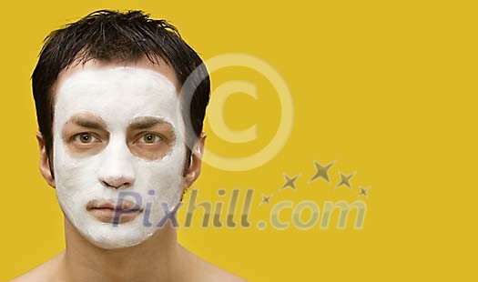 Man with a skincare mask