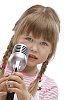 Little girl with a microphone