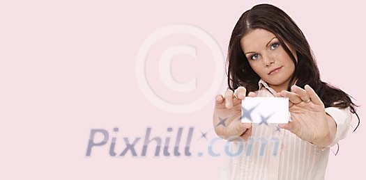 Woamn showing a blank business card Woamn showing a blank business card