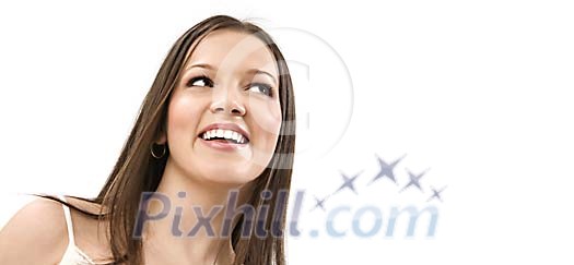 Teenage girl smiling, looking up