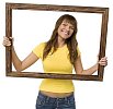 Teenage girl holding a picture frame