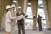 Men and women at the constuction site inspecting