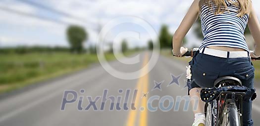 Woman biking on the motorway