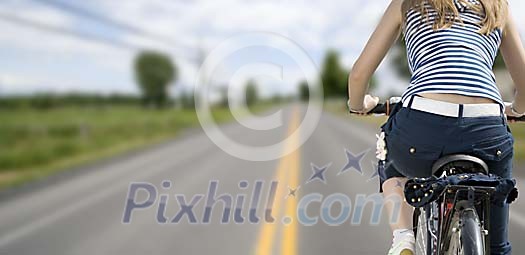 Woman biking on the motorway Woman biking on the motorway