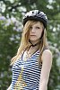 Girl with a cycling helmet