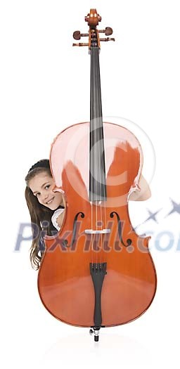 Isolated girl hiding behind a cello Isolated girl hiding behind a cello