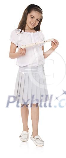 Isolated girl standing with a flute