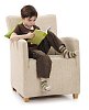 Isolated boy on the chair, reading