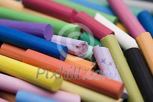 Background of different coloured crayon