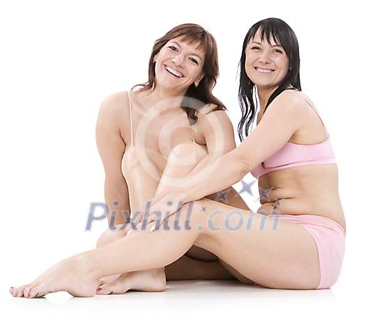 Isolated women sitting on the floor in their underwear