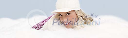 Woman in snow smiling