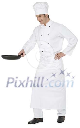 Isolated man dressed as chef frying