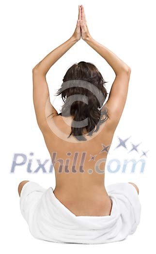Isolated bare backed woman sitting on the floor Isolated bare backed woman sitting on the floor