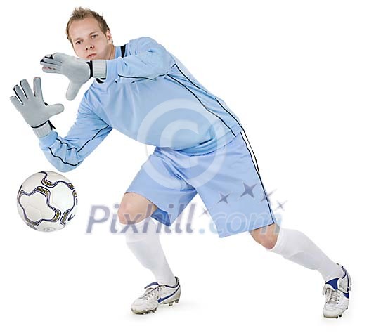 Isolated footballer blocking ball